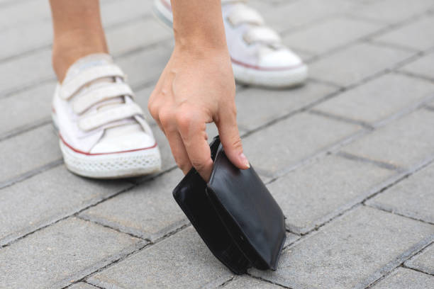 Woman found lost leather wallet on the street